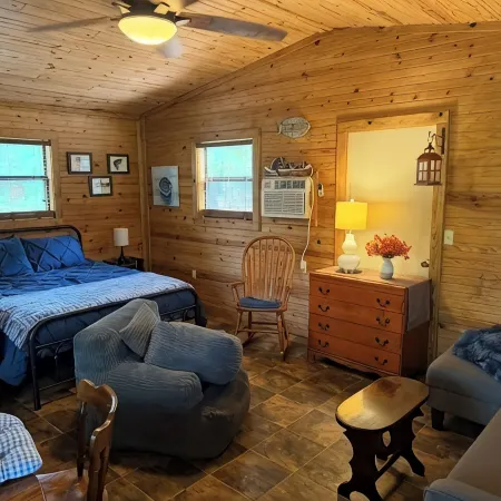 Buckeye cabin is nestled in the woods with access to the Little Missouri River.