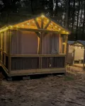 Mentone glamping getaway in a  private screened in cabin in charming Mentone
