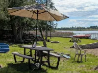 Charming 4-bedroom cottage ON Tawas Lake Pet, kid-friendly. Great Bird watching! - 4-Star
