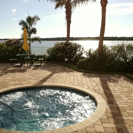Top-Floor Waterfront Condo with Bay View + Pool and Hot Tub