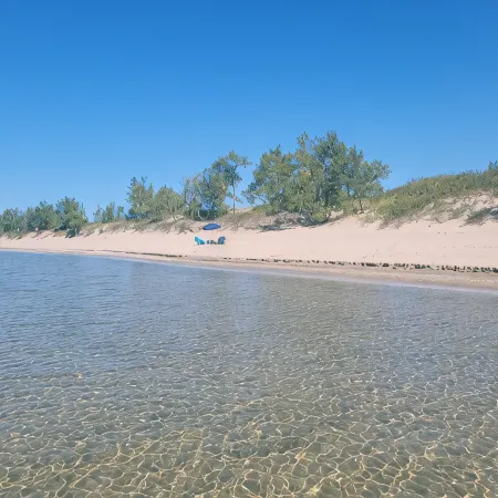 Family Resort Cottage Near Sandbanks | Pools, Lake Access, A/C & Screened Porch