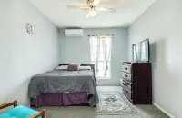 Spacious deck 5-bedroom home in Freeport with WiFi, 3 full baths sits on canal. - 4-Star