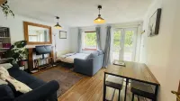 Stylish Garden Flat Near Loch Ness, Ideal for Families and Groups