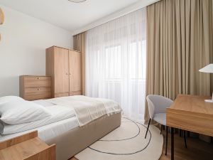 Beige Apartment Poznan by Renters