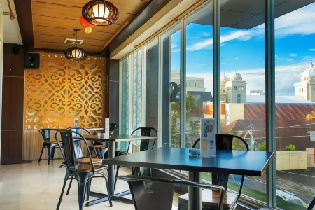 Jle's Boutique Hotel Powered by Archipelago Отели в г. Манадо