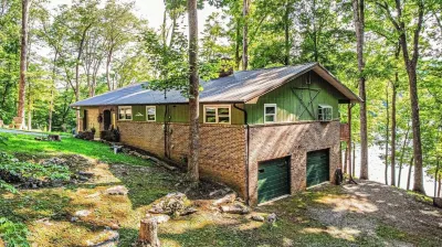 Hickory Harbor lakefront w/ dock, grilling deck, and play yard on shady lot!