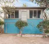 Refined Miner’s Cottage: Fenced Yard, Screened Porch.
