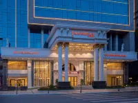 Vienna International Hotel (Hechi Tonggu)