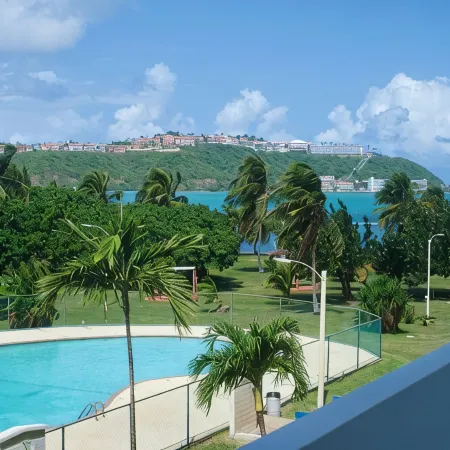 Private Island 1BR Condo with Oceanview, Pool View, 500MB WiFi & A/C