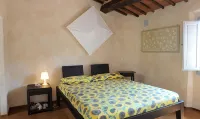 Tuscan village in SIena. farmhouse surrounded by garden,pool and panoramic view