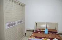 Cozy 2-bedroom apartment in welcoming Flic en Flac with WiFi, AC, close to beach