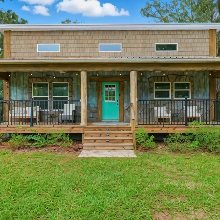 Sea Cow Retreat - Near Springs + Porch, Covered Deck & Fire Pit