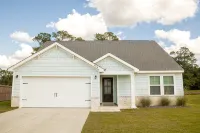 The 15th Fairway Cottage - water view close to beach & downtown Ocean Springs! - Homestays
