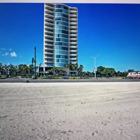 Floor to Ceiling Windows Overlook the Gulf of America's Pristine White Beaches
