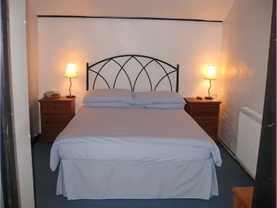 The Woodlands Hotels near Vision Express Opticians at Tesco - Ely