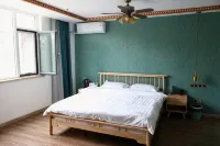 Wenshi Qingsu Homestay - Inns