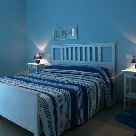 Marigrè: A Beautiful Beach House with a Solarium, Wooden Walkway, Sun Deck, and Garden.