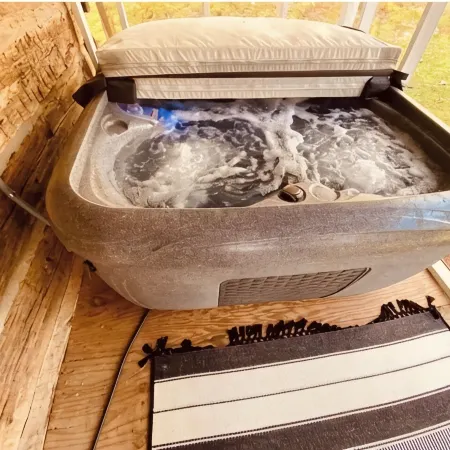 Charming and modernized 1800's Creekside Cabin w/Hot Tub and 5 minutes to I-77