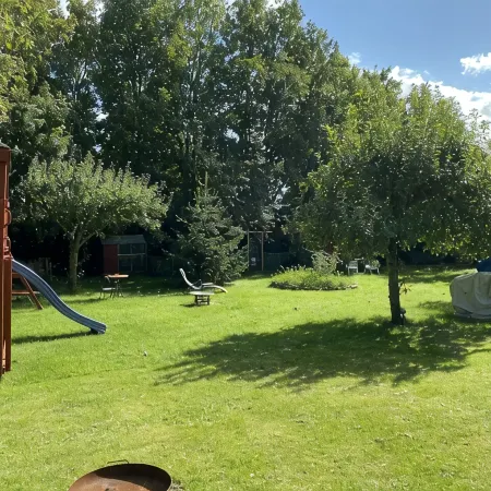 Vacation apartment "Kleine Möwe" with large garden in the heart of Pilsum