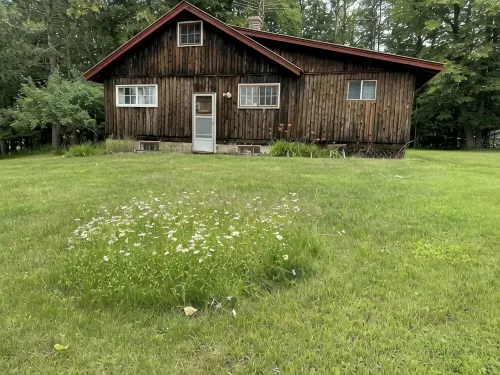 Vintage 1920s Speakeasy Cabin Overlooking the Sandy Shores of Swan Lake!