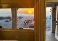 Totally Remodeled Beachfront Studio-Step out your door onto the sand. Really! D