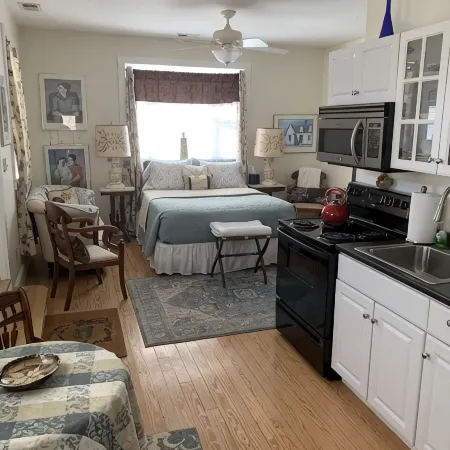 Brookside Cottage is a beautiful open concept doll house stay for two.