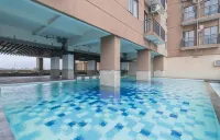 RedLiving Apartemen Tamansari Panoramic - Rasya Room