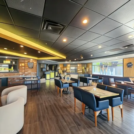 Merit Hotel & Suites