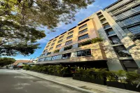 Eutopiq Hotel Hotels near caital mega shoes