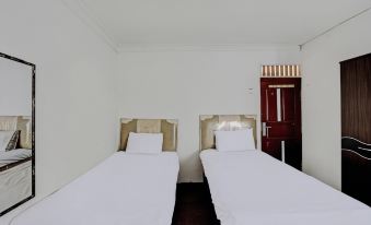 Spot on 92529 Penginapan Wisma Bintang Syariah Near MTS Al Ma'Arif Kota Bangun