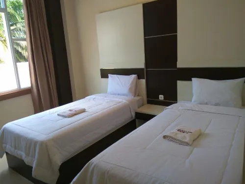 Galaxy Inn Hoteles en Wolio