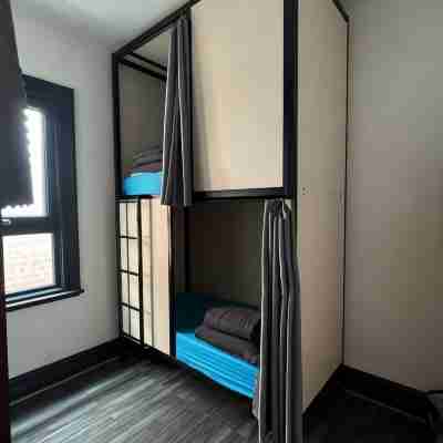 Haus Accommodation - Note - Valid Passport Required to Check-IN Rooms