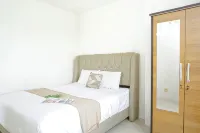 Cozy and Simple 1BR at Apartment Grand Sentraland Karawang By Travelio - Homestays