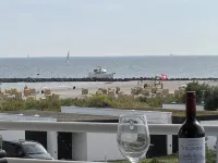 Sunny balcony with sea view directly on the beach