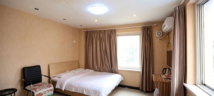 Jinlong Business Hotel Hotele w: Fuxin
