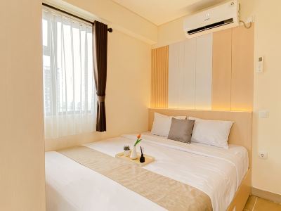Modern Versatile 3BR at Meikarta District 2 Apartment By Travelio