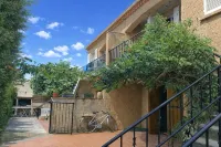 Apartment with balcony upstairs of a villa 300 m from the sea