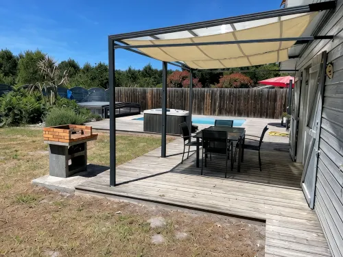 Close to Soulac/sea air-conditioned chalet, heated indoor swimming pool, jacuzzi