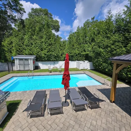 Tranquility Near the Sea with in-ground salt water pool and fenced in yard.