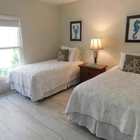 Stunning beachfront condo next to restaurant & a short drive to famous RumPoint