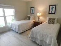 Stunning beachfront condo next to restaurant & a short drive to famous RumPoint