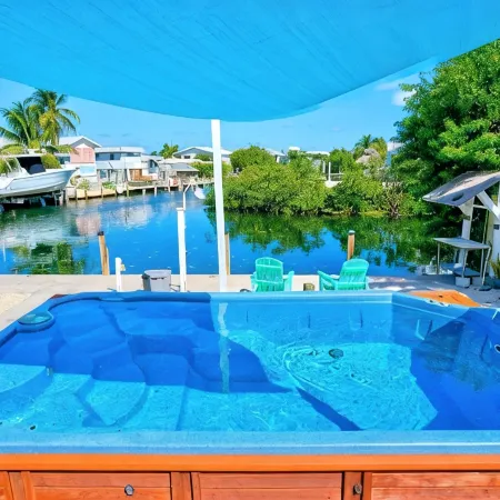 FL Keys Waterfront Heated Pool Home w/ 60 Feet of Dockage & Tiki Hut