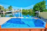 FL Keys Waterfront Heated Pool Home w/ 60 Feet of Dockage & Tiki Hut - Gym