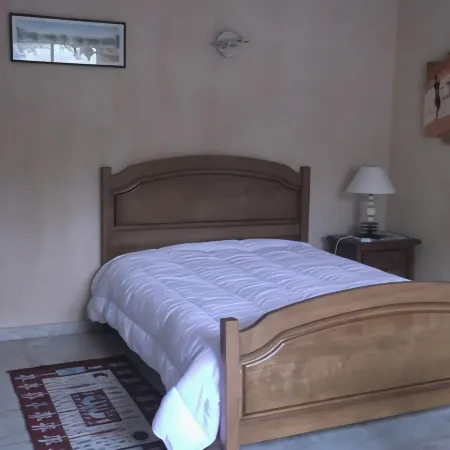 Cottage with private garden in wooded property with swimming pool