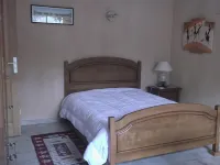 Cottage with private garden in wooded property with swimming pool