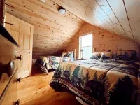 Riverfront Cabin : The Cozy Brown Trout Lodge Hotels in Oscoda County