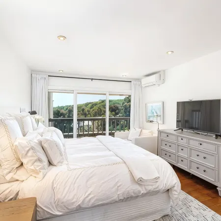 Malibu 2-bedroom designer furnished condo with AC. Central to everything!