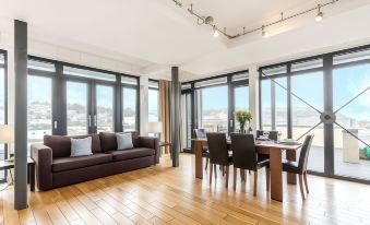 Beachfront Penthouse Apartment with Wrap-Around Balconies and Panoramic Sea Views