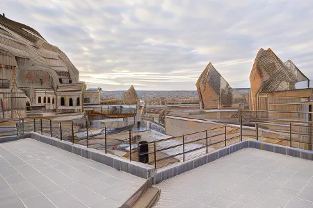 Majestic Cave House Отели рядом с достопримечательностью «Airport Transfer Company»