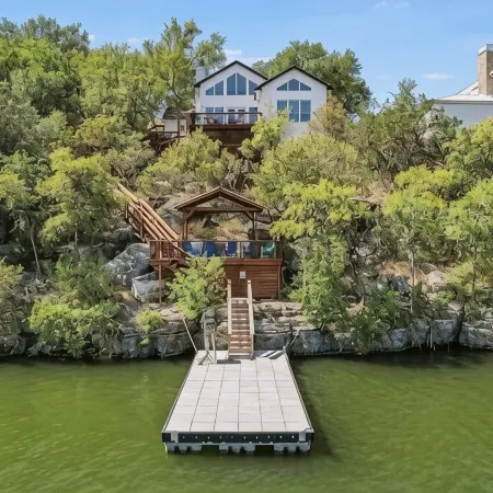 A rare find - bright gorgeous 3 bedroom home nestled on Lake Marble Falls!